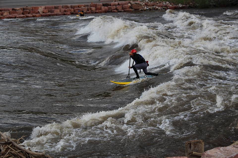 whitewater paddle boarding