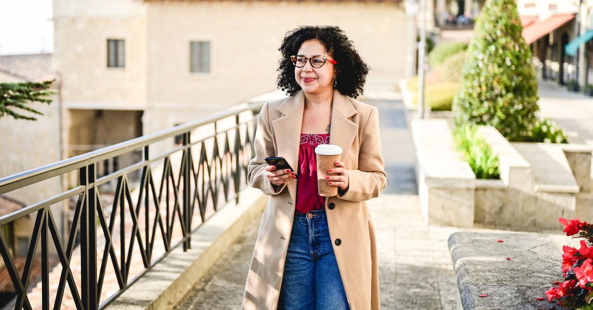 An OnlyFans creator relaxing while QuickBooks organizes her personal finances.