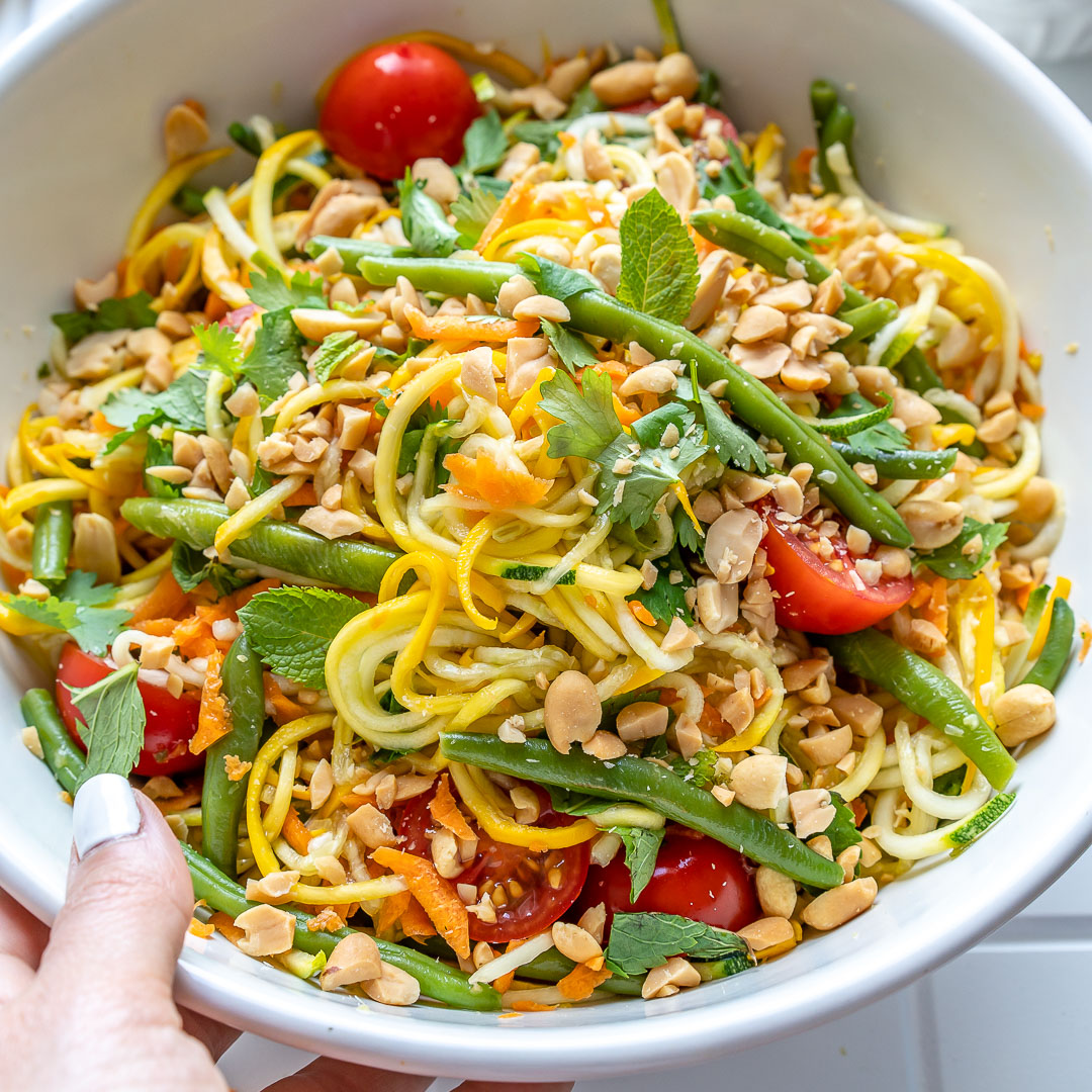 A cold noodle salad with green beans, peanuts, and mint