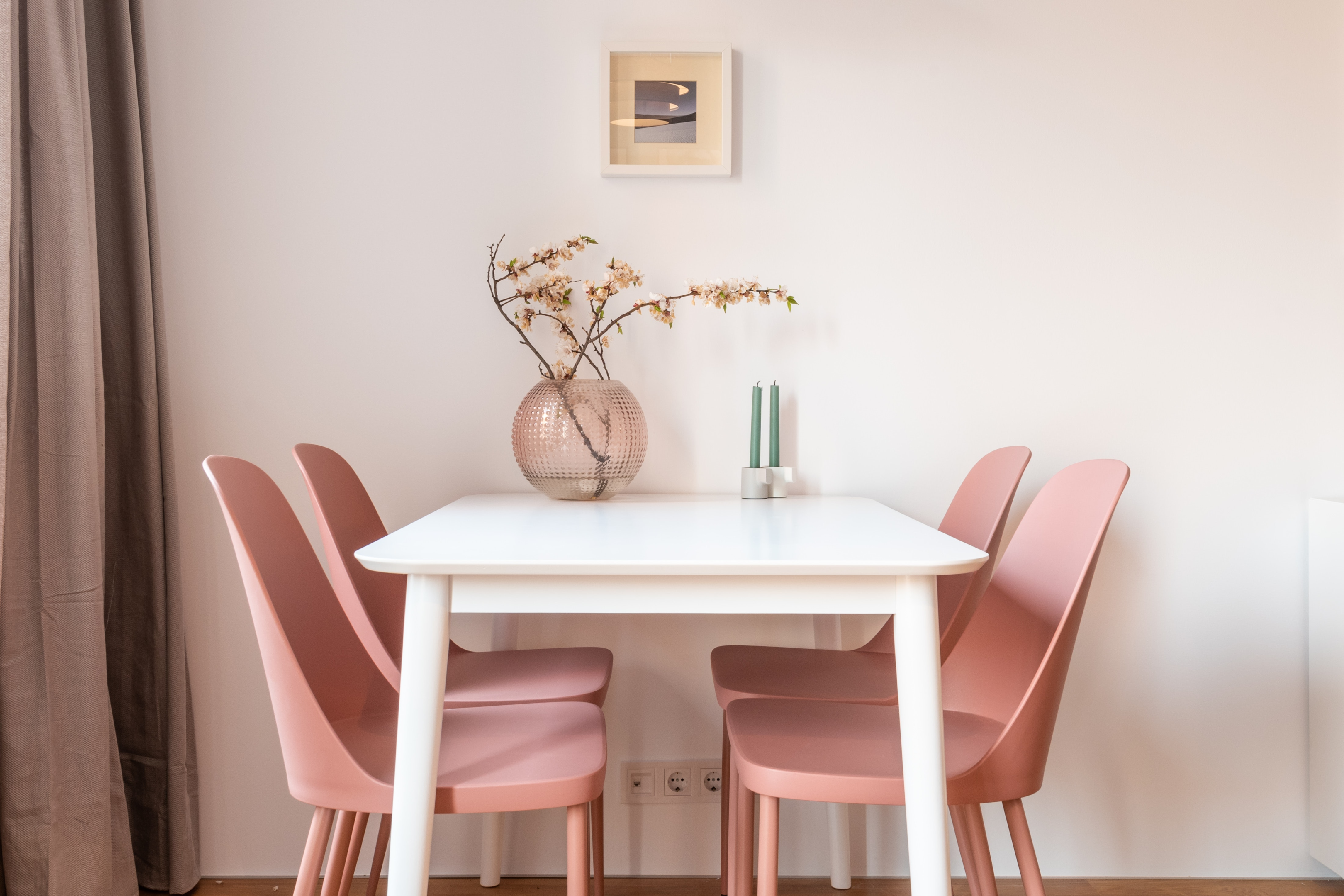 Photo by Max Vakhtbovych: https://www.pexels.com/photo/dining-table-and-pink-chairs-in-light-dining-room-6180675/