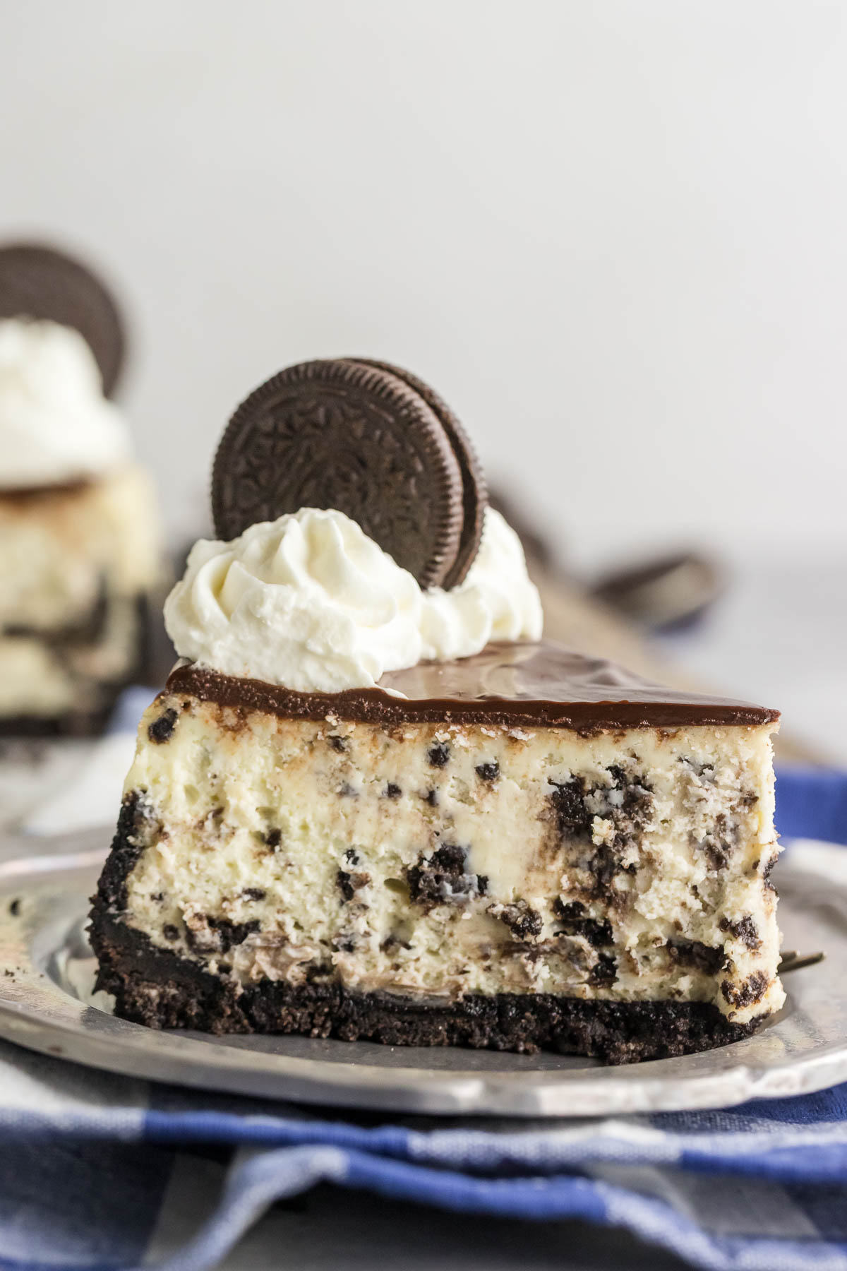 slice of Oreo cheesecake on a plate