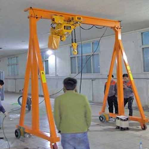 Portable gantry crane being used for plant maintenance