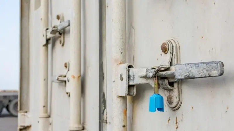 A container door secured with a security seal