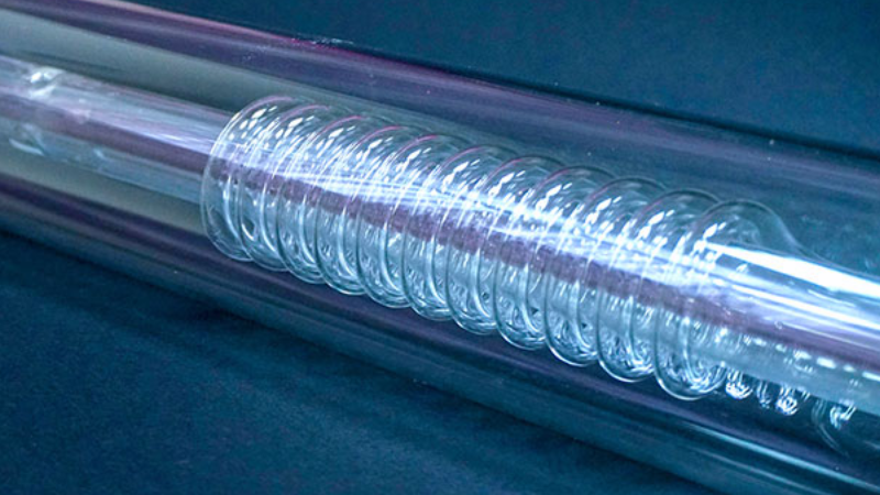 A close up shot of a DC glass laser tube.