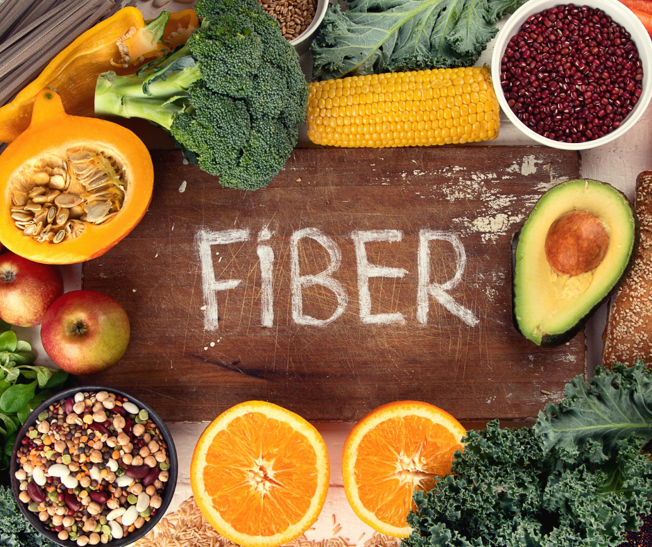 A visual representation of high fiber foods such as beans, whole grains, and fruits that can help alleviate constipation after quitting drinking alcohol