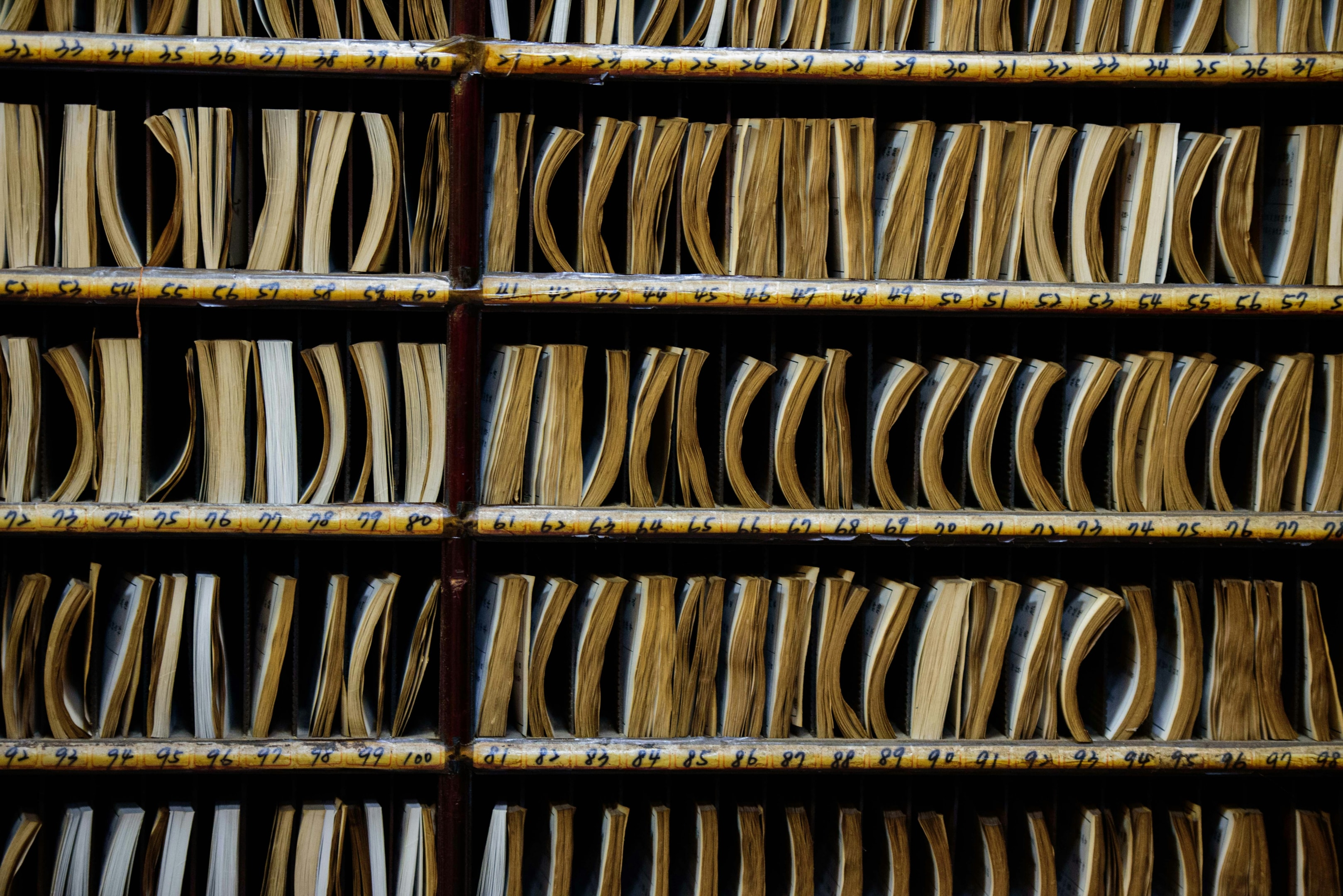 Rows of public records available for accessing at a courthouse, including divorce filings.