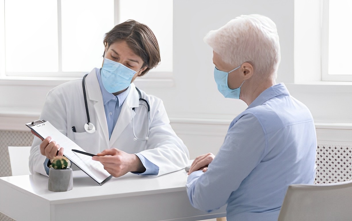 A photo of a doctor explaining to a client