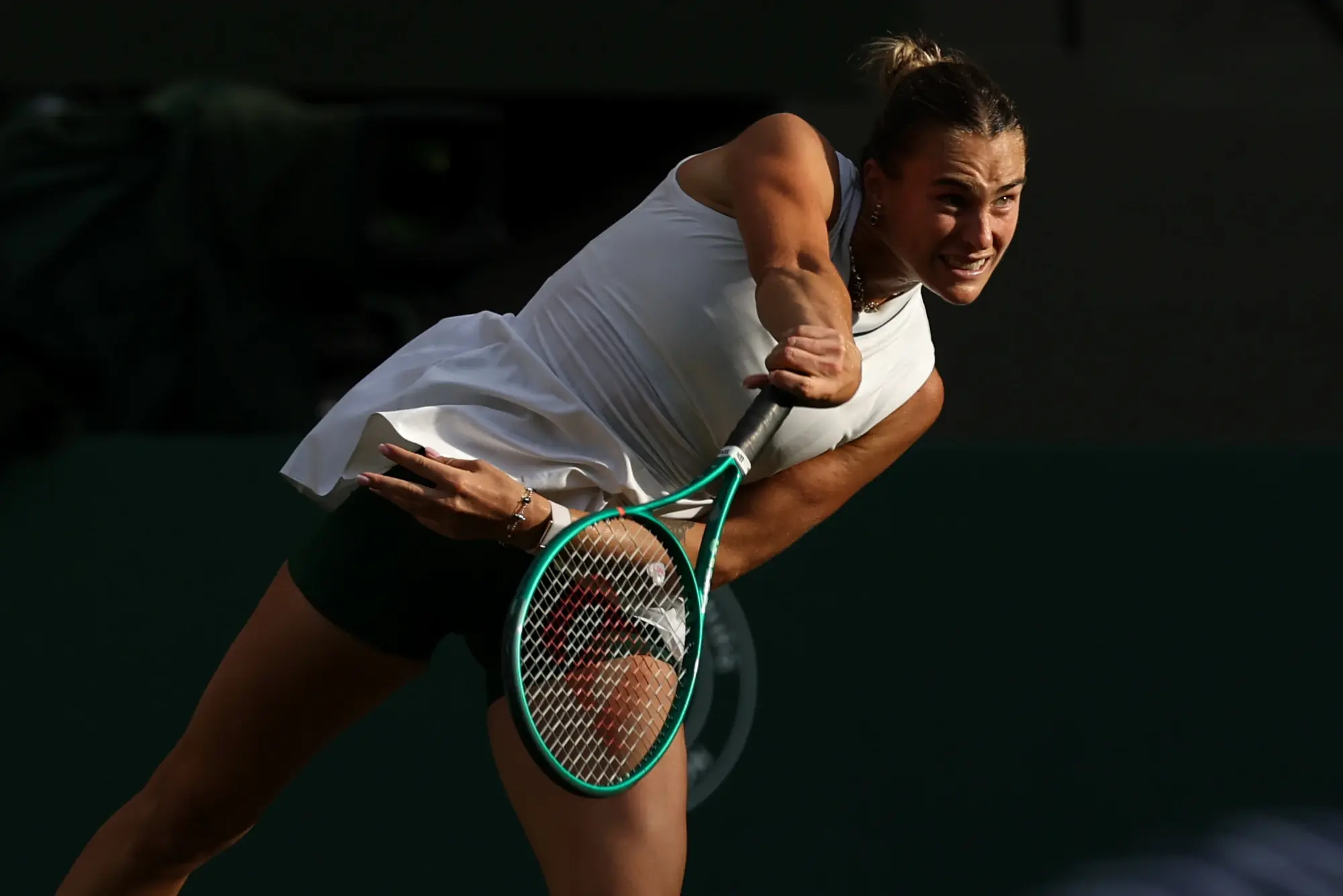 Jul 5, 2026; London, United Kingdom; Aryna Sabalenka serves against Naomi Osaka  on day seven of The Championships Wimbledon 2026 at All England Lawn Tennis and Croquet Club.