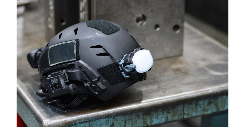 Tactical helmet mounted light