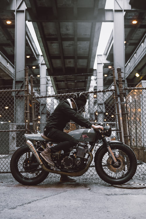 motorcyclist-fence