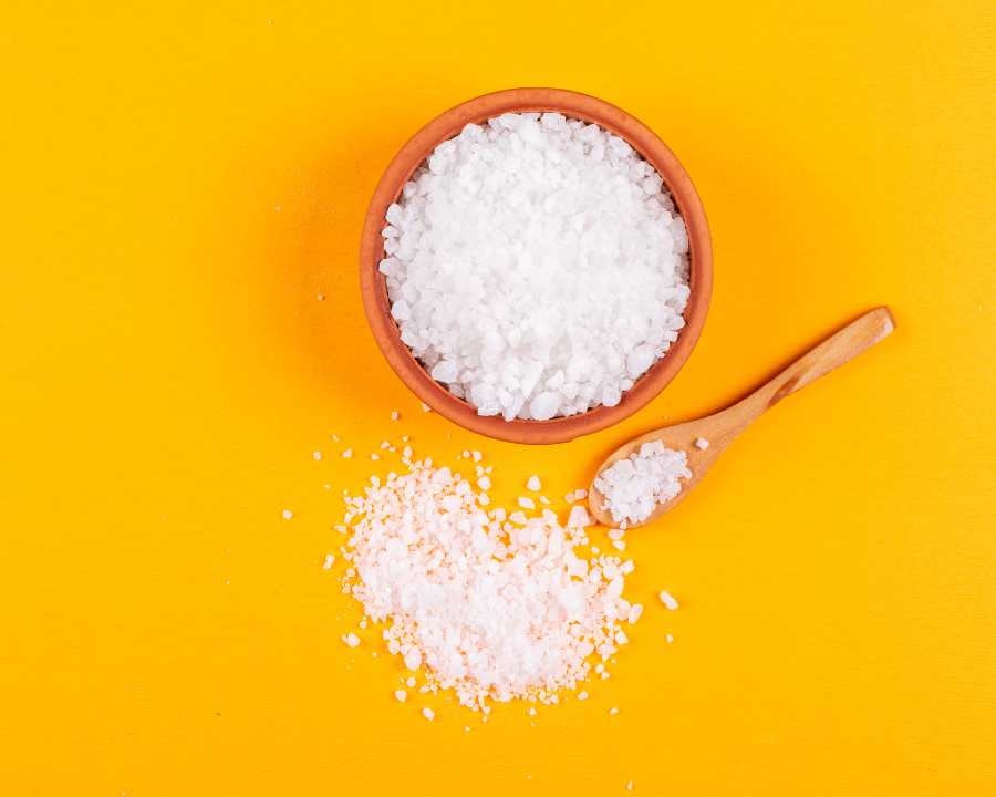 MSM (Methylsulfonylmethane): A Guide to Benefits, Dosage, and Safe Usage – clay bowl and spoon with spilled MSM.