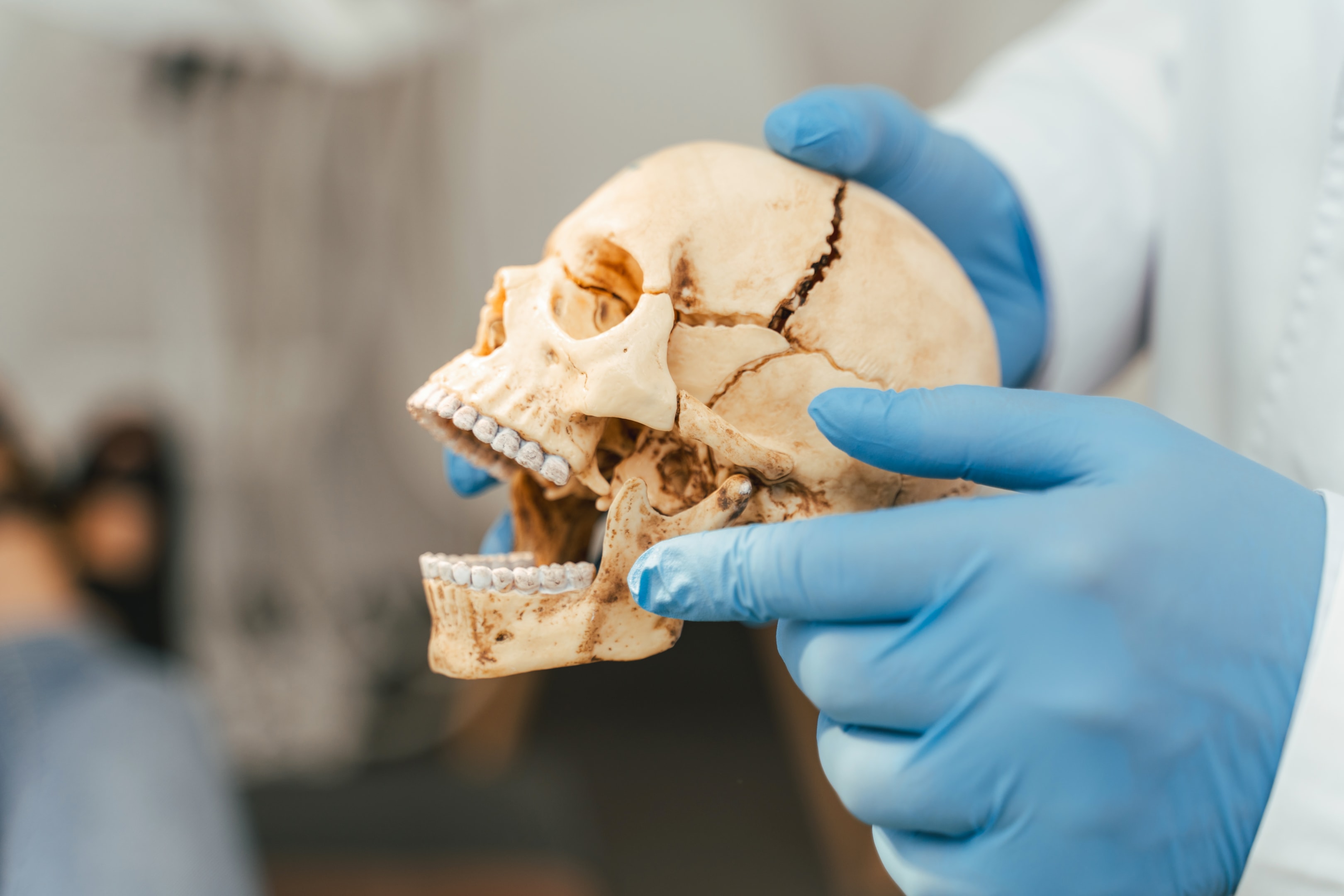 an oral surgeon demonstrating different physical therapy exercises to help with jaw joint discomfort