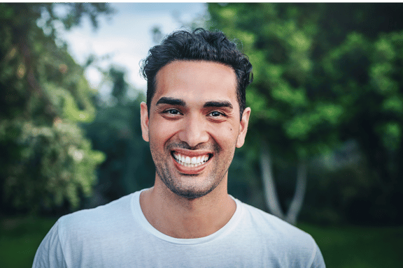 young man with a bright happy smile