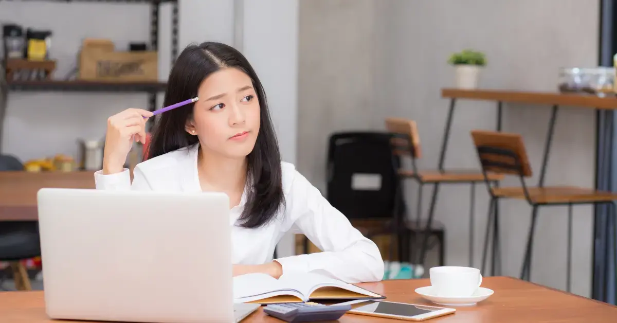 Woman thinking when do tax transcripts update for OnlyFans creators.