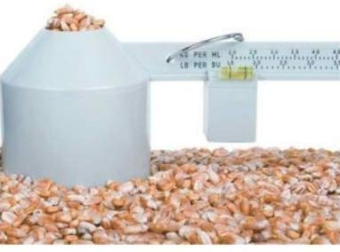 Grain scale with a bushel of grain on it