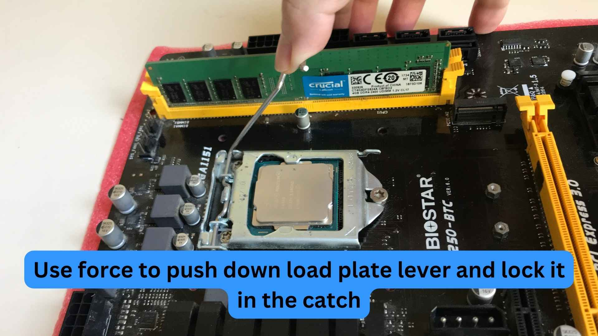 Close load plate and push lever down to secure