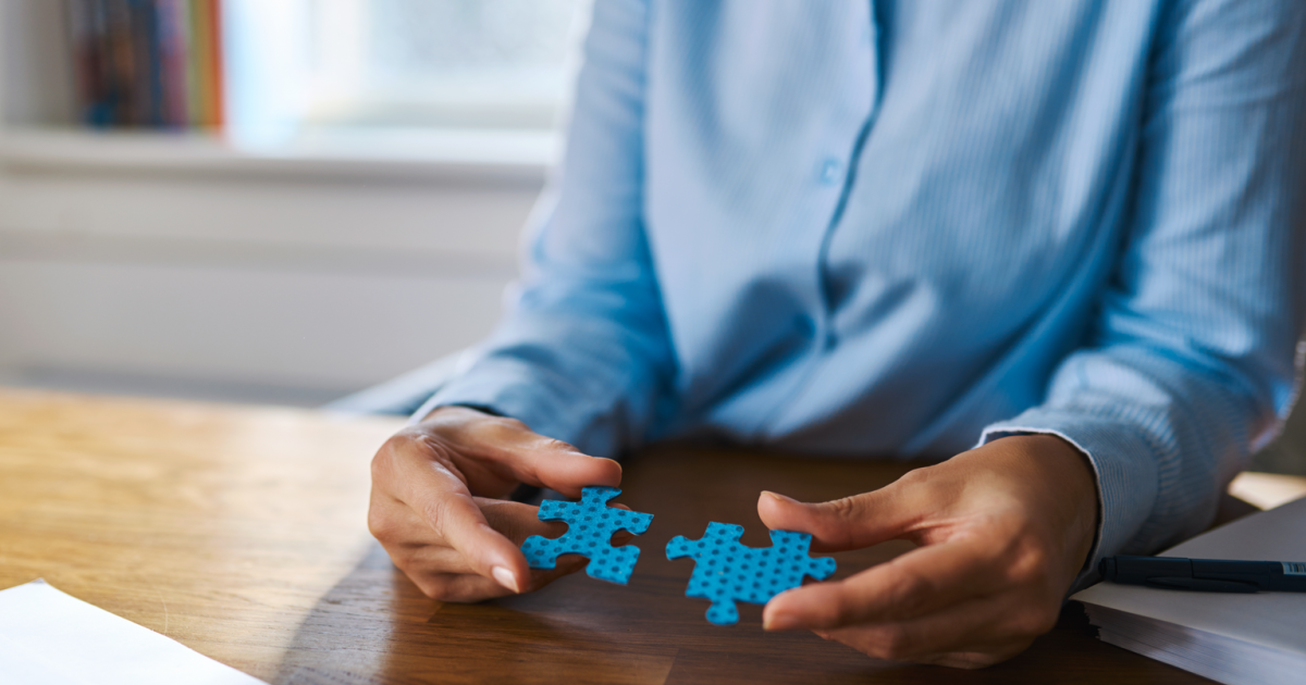 Image of two puzzle pieces being fitted together, acting as a metaphor for the adaptation process of LGBTQ+ couples in New York City fighting against dead bedroom syndrome. The image encapsulates the challenges and satisfaction of finding harmony in differences, just like two distinct puzzle pieces coming together to form a complete picture.