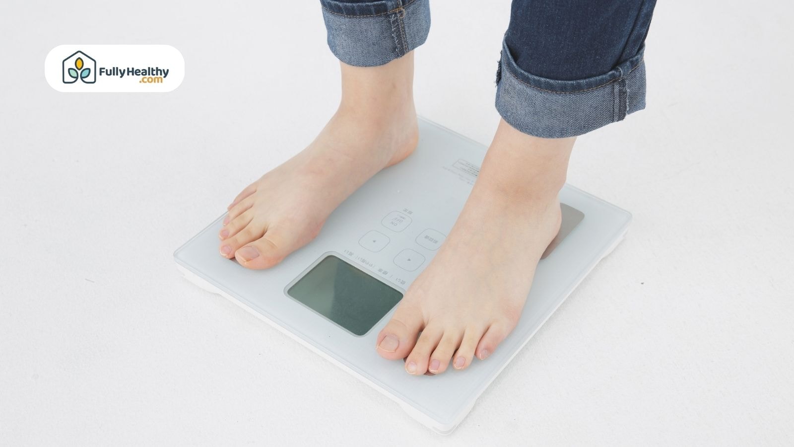 Person standing on white digital scale