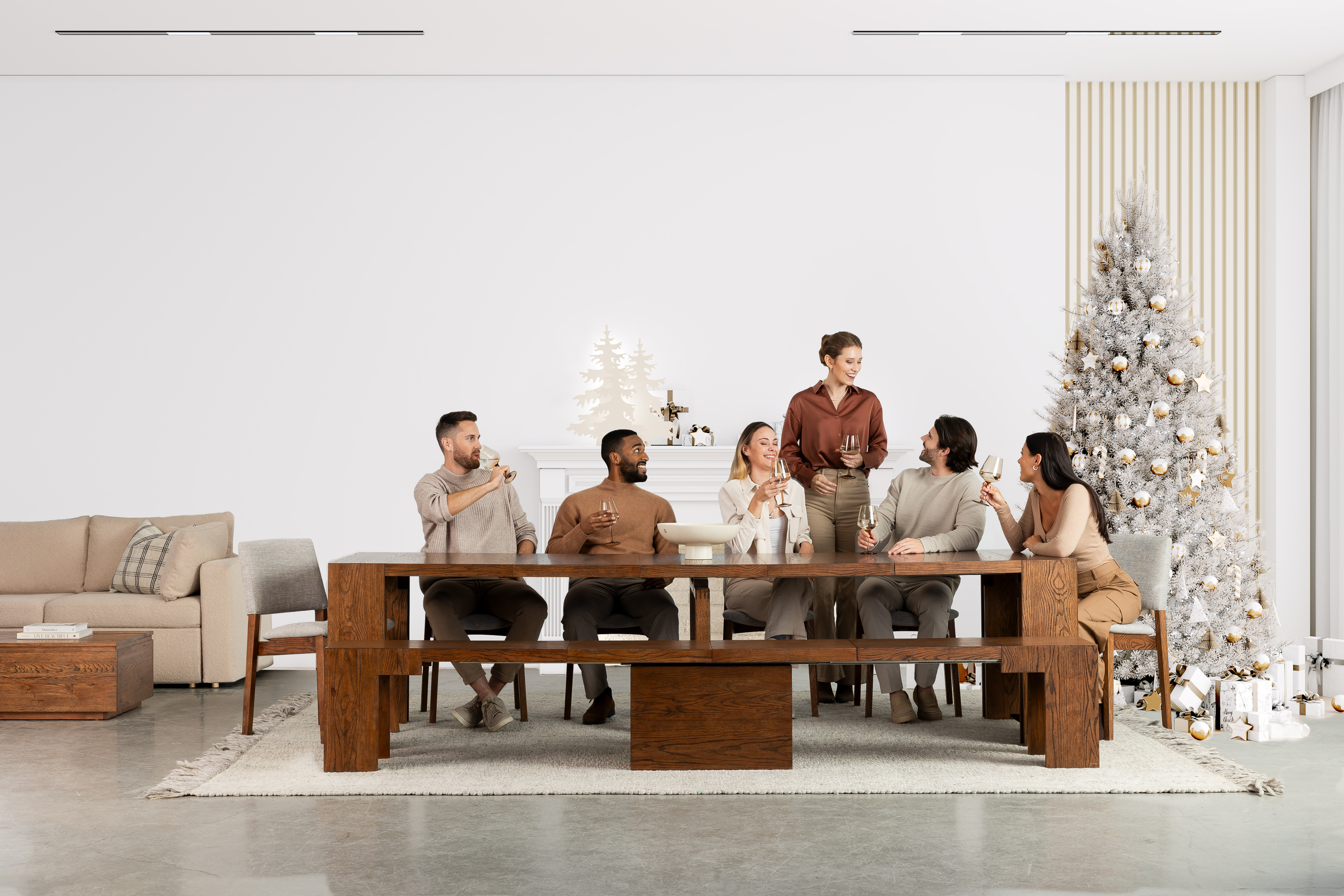 A family sitting down at a dining table for Christmas
