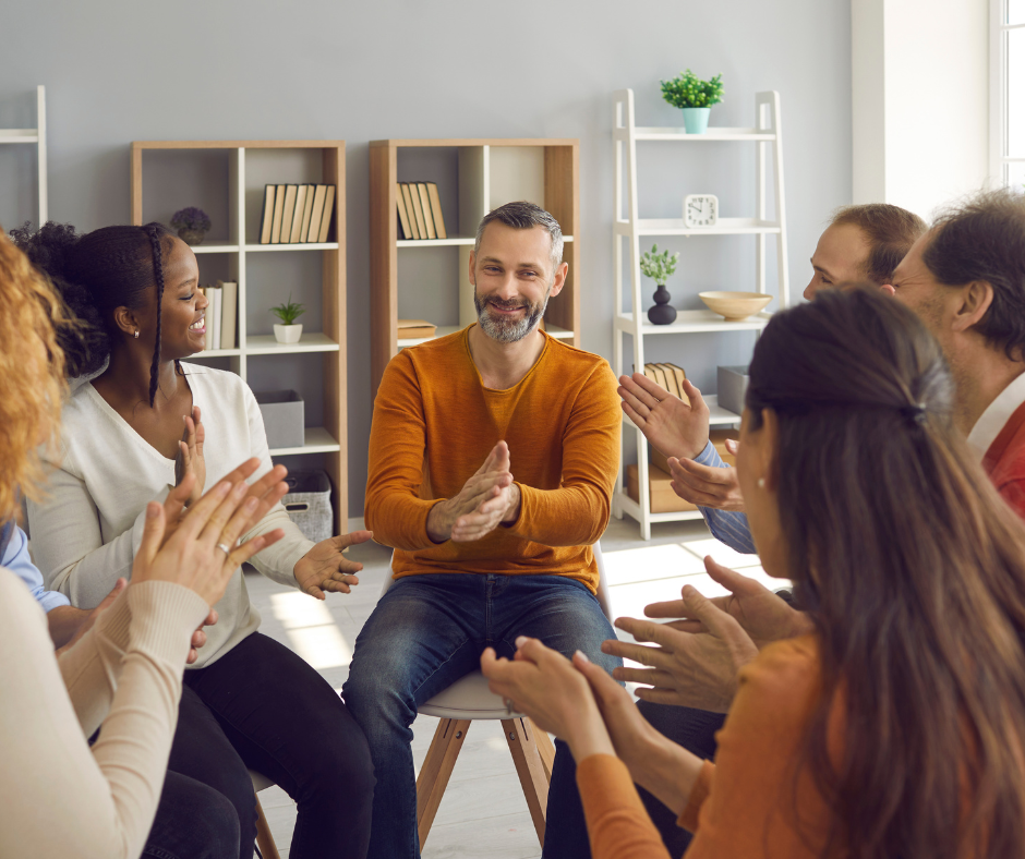 A patient in a drug rehab facility talking to a support group