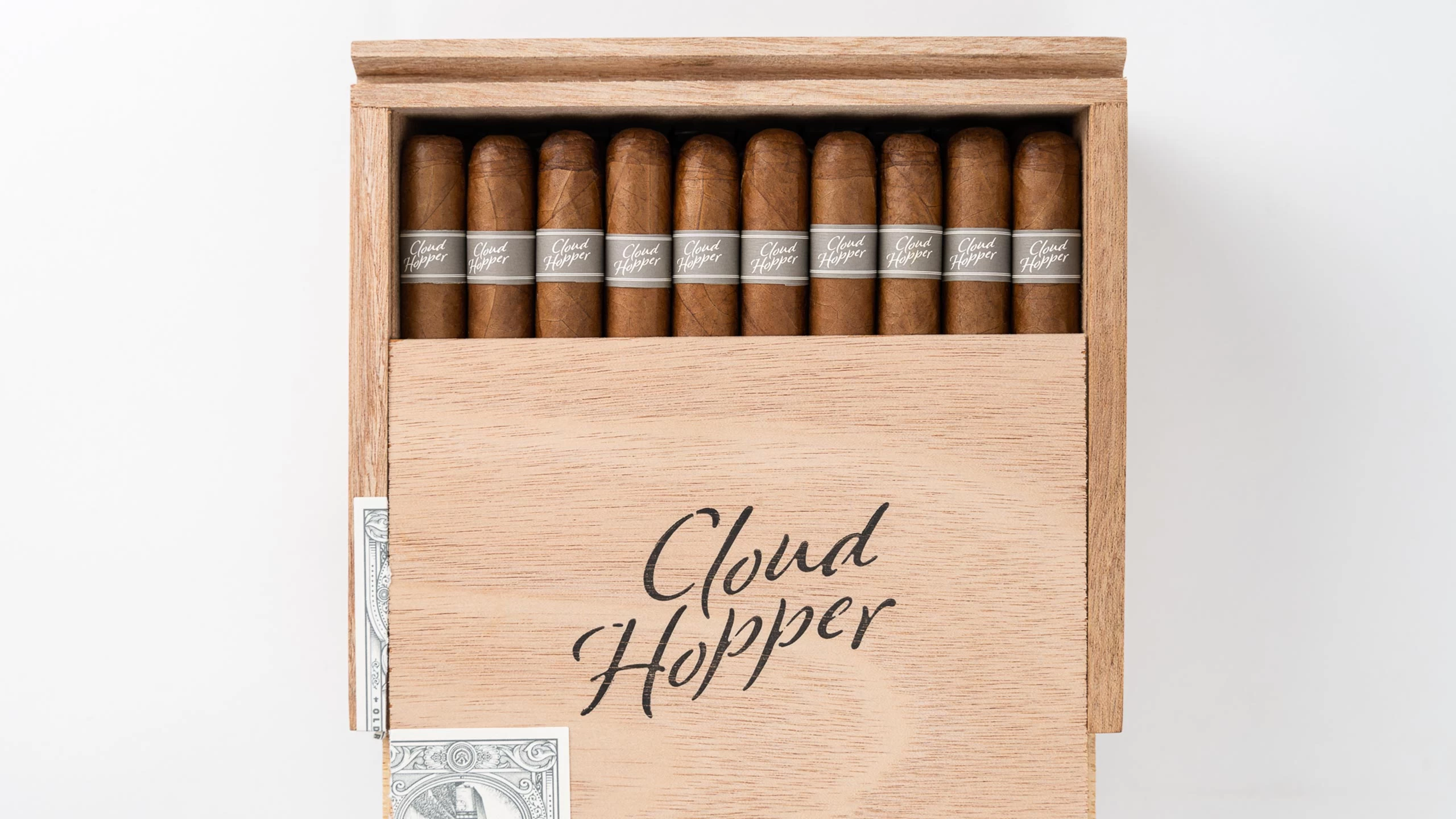 An illustration of various Edition One Cloud Hopper cigars displayed elegantly.