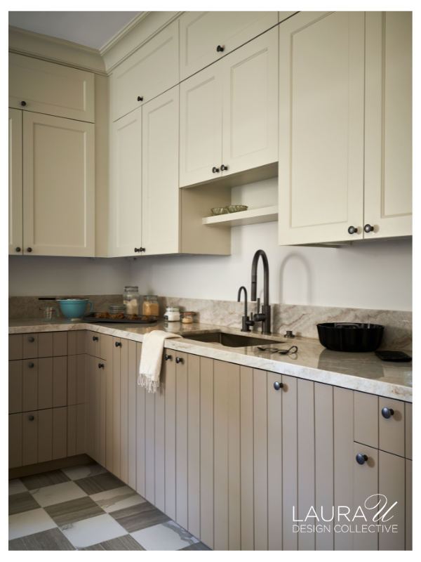 Dedicated prep kitchen at Huntwick Forest with custom cabinetry, pantry storage, and additional workspace for entertaining.