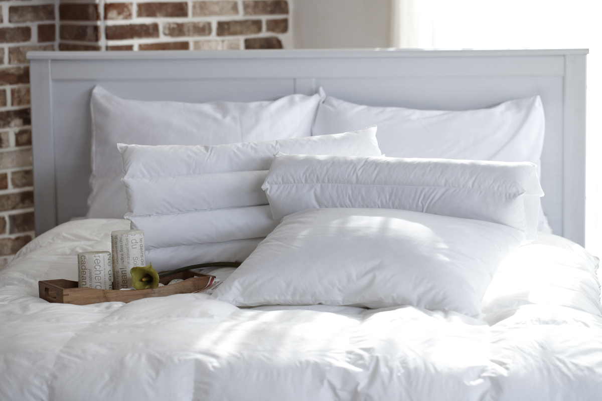 Cozy bedding essentials including blankets and pillows.