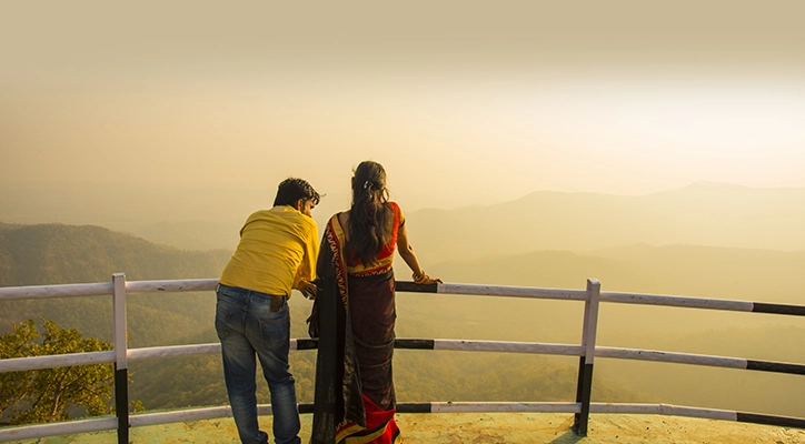 A couple enjoying the sunset close to San Diego.