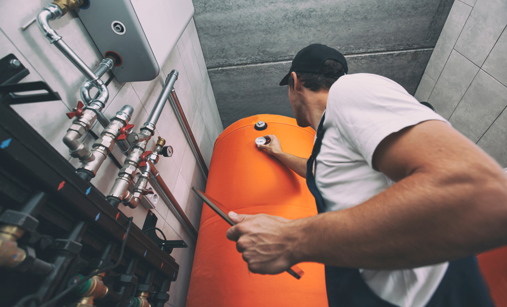 Regular maintenance of a water heater to prevent leaks