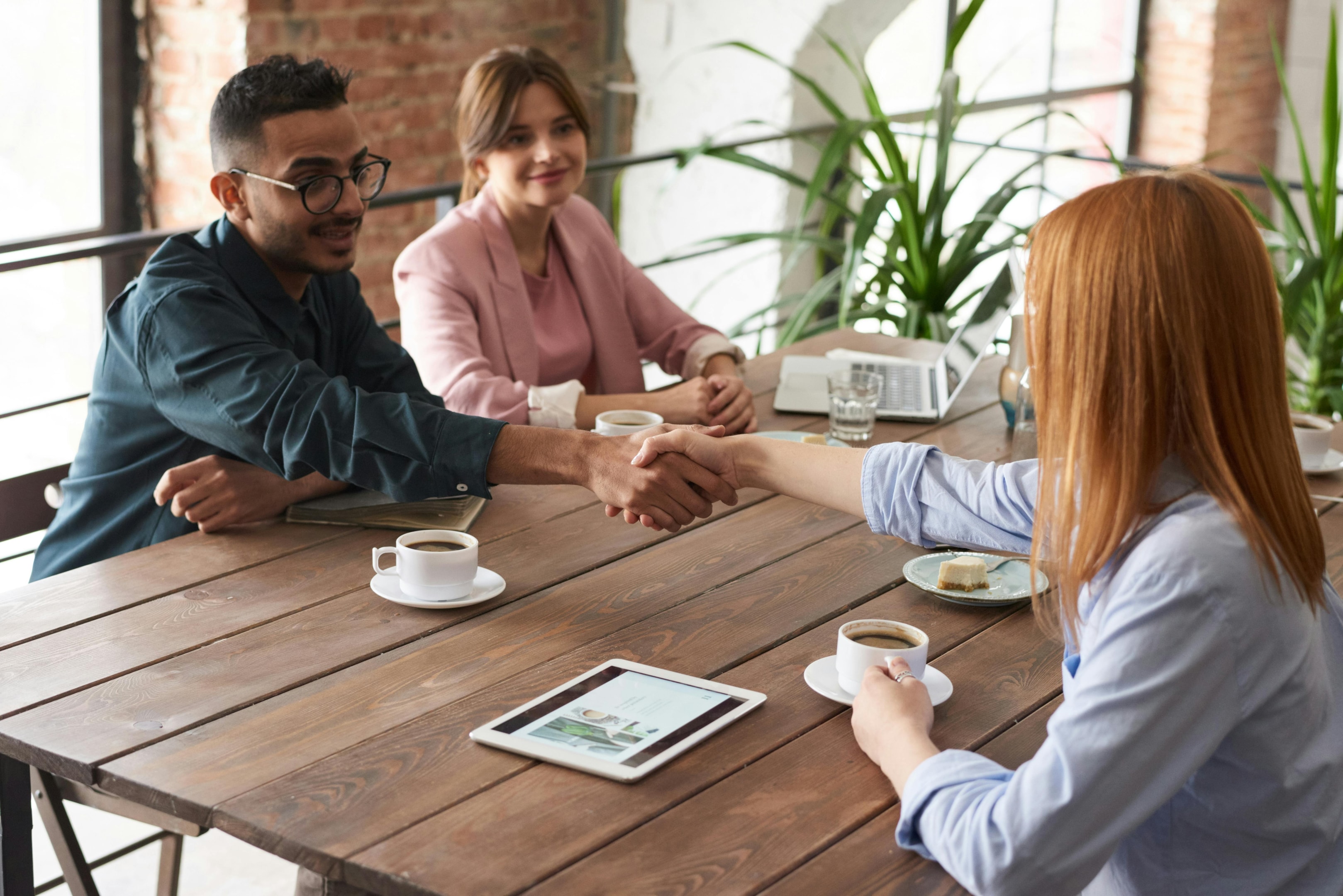 Real estate investor meets with beneficiaries of probate property. 