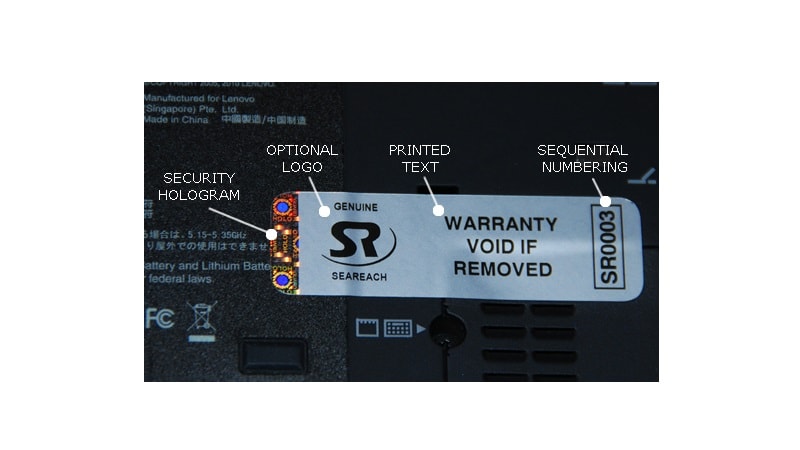 Device with warranty label featuring security hologram