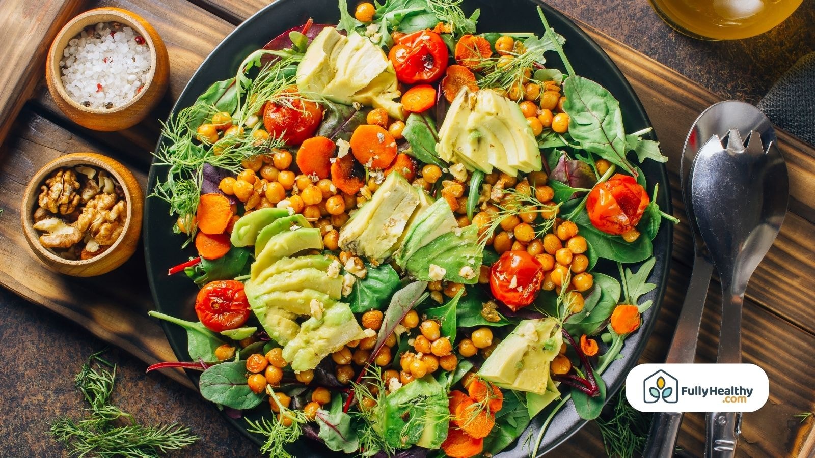 Roasted chickpea salad with avocado tomato and mixed greens