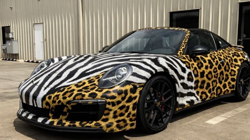 A car wrapped in animal print vinyl wrap having Cheetah and Zeebrah stripes