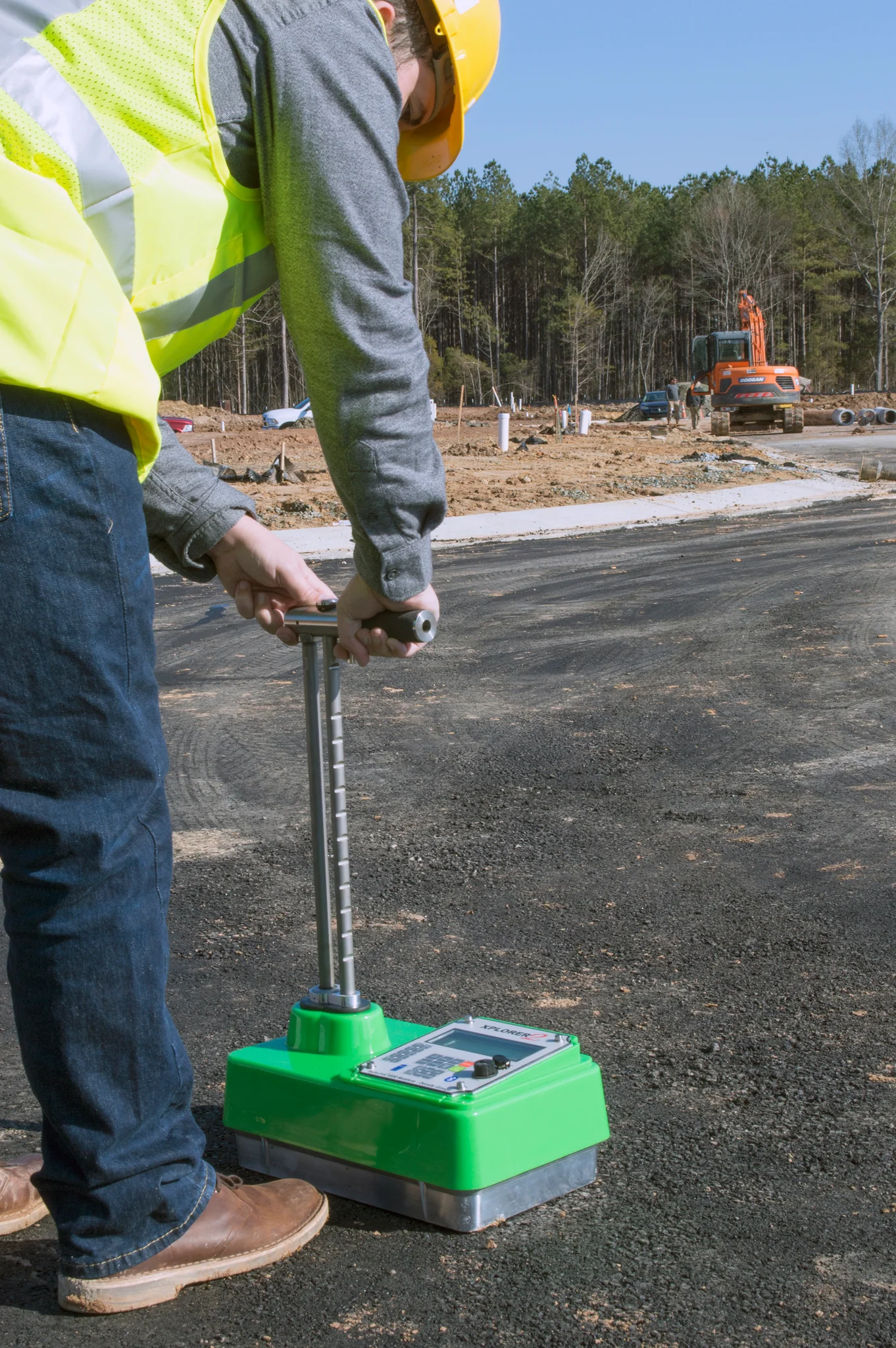 Nuclear density gauge in use on construction site