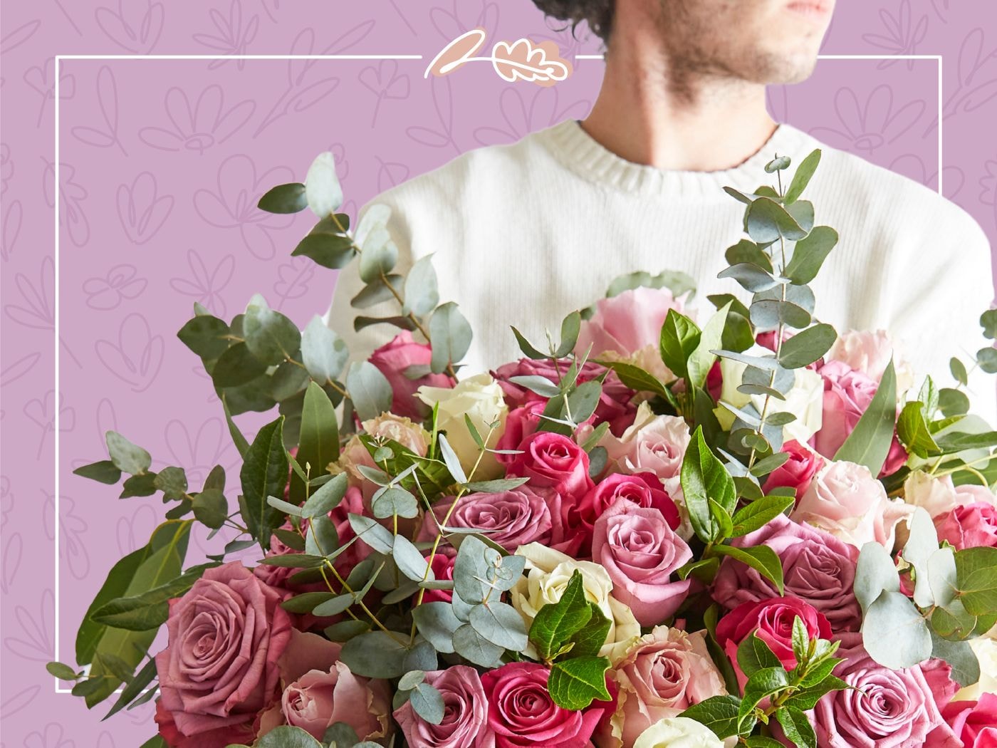 Man holding a bouquet of pink, red, and white roses, illustrating the variety of rose species and their role in modern flower shops.