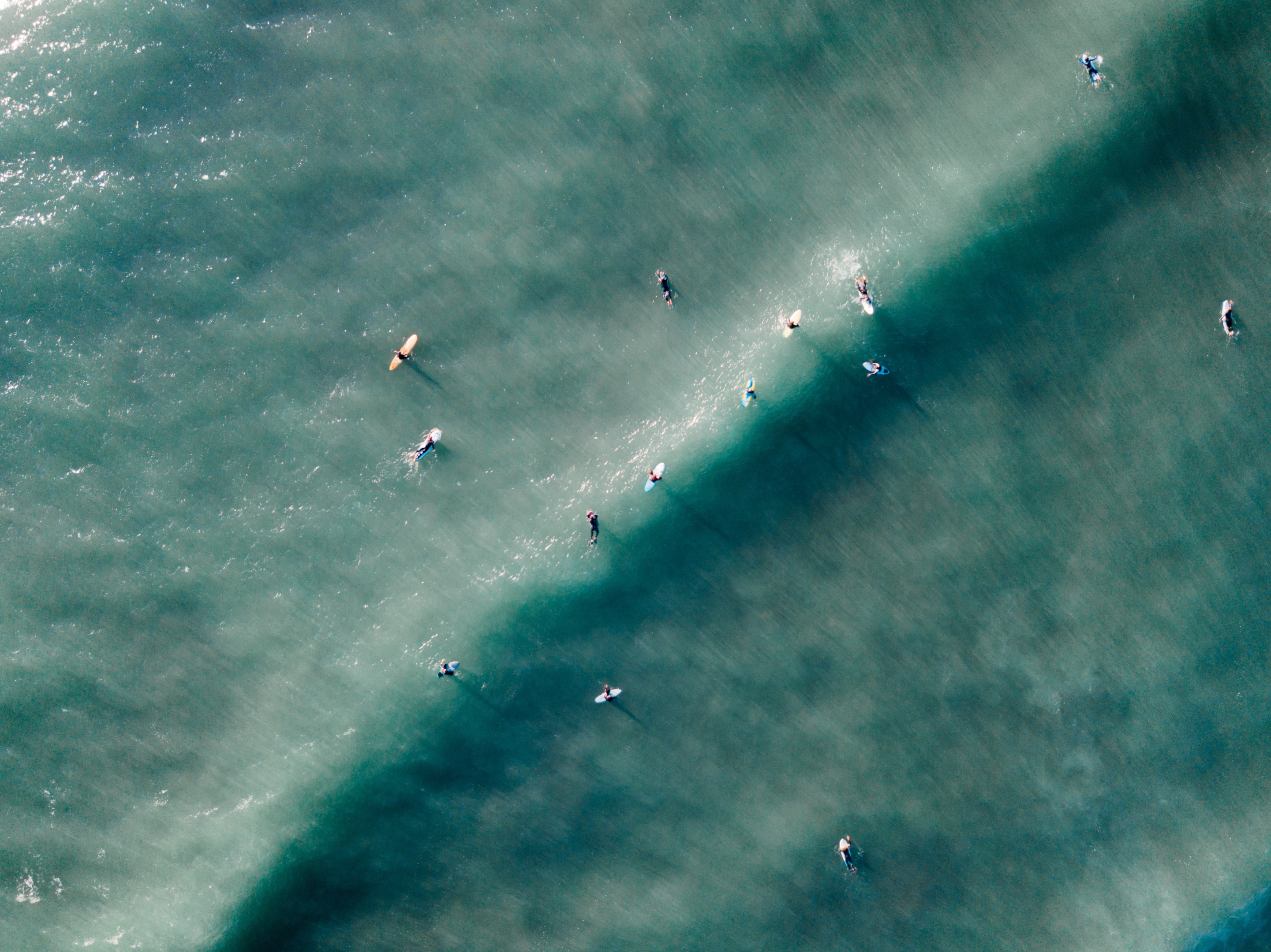 People surfing in Ericeira, Portugal