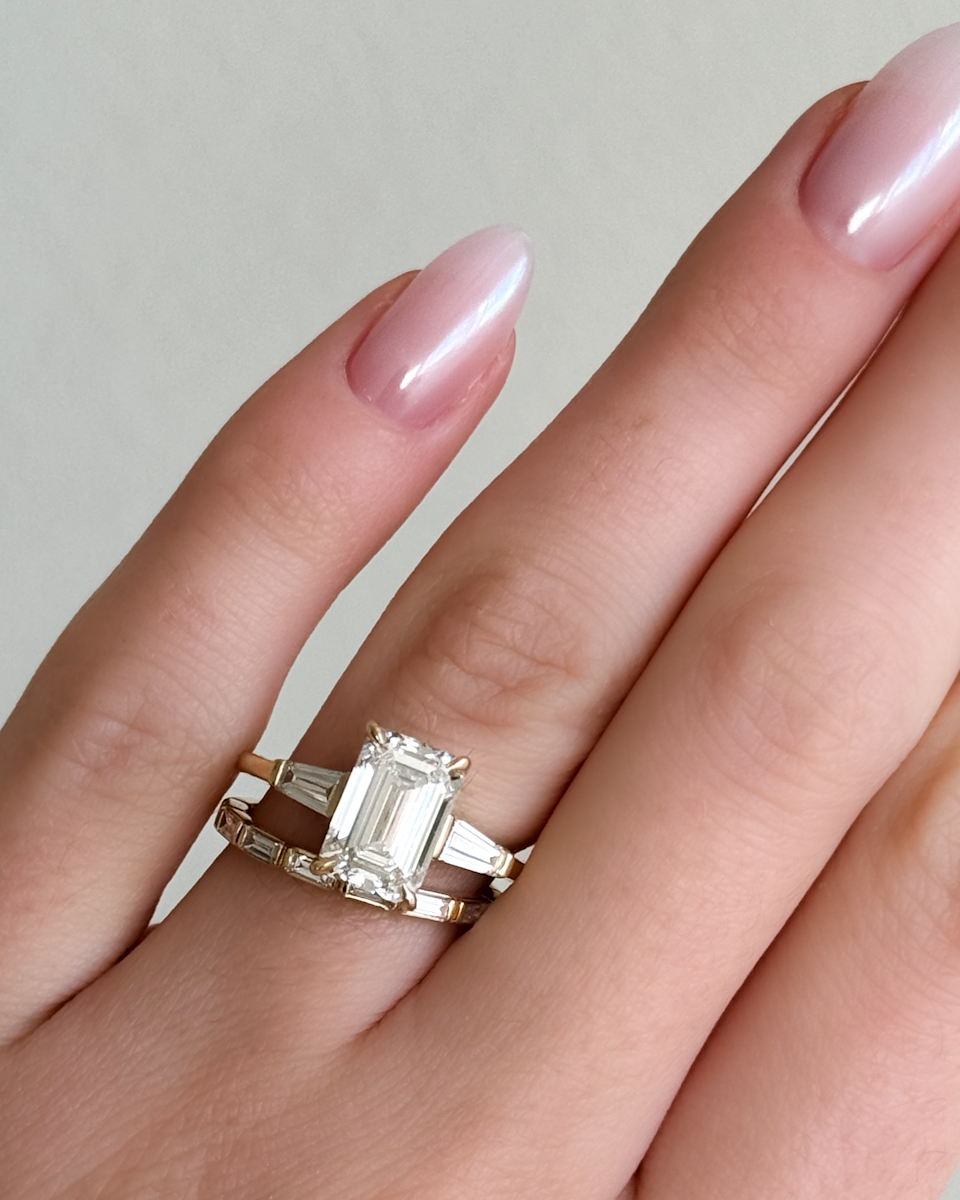 BAGUETTE DIAMOND RING WITH EMERALD CUT ENGAGEMENT RING IN YELLOW GOLD