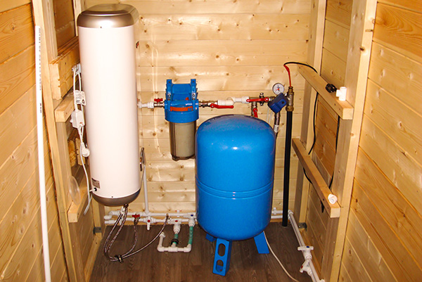 Pressure tank inside a well house