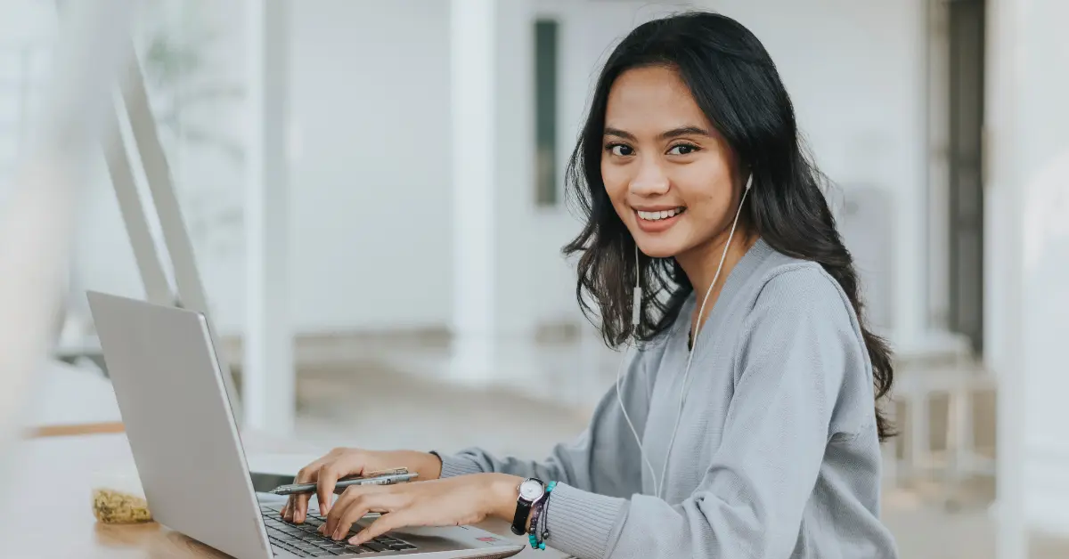 Woman surfing online about how to file OnlyFans taxes.