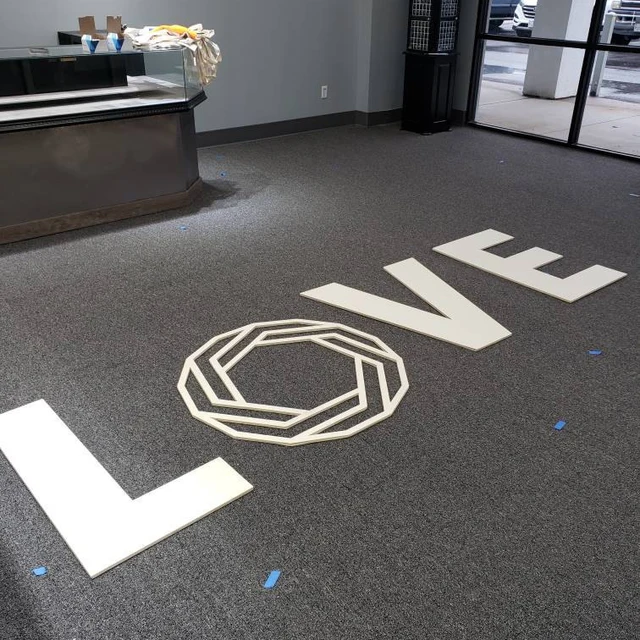 Giant LOVE letters we cut into a sign for a Virginia jewelry store to display in their window.