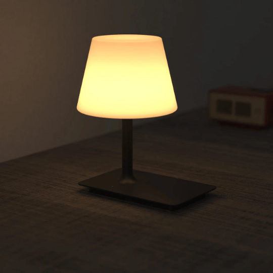 A modern entryway table lamp with a warm ambient glow, featuring a sleek black base and soft white shade—perfect for creating a welcoming and stylish entryway lighting setup.