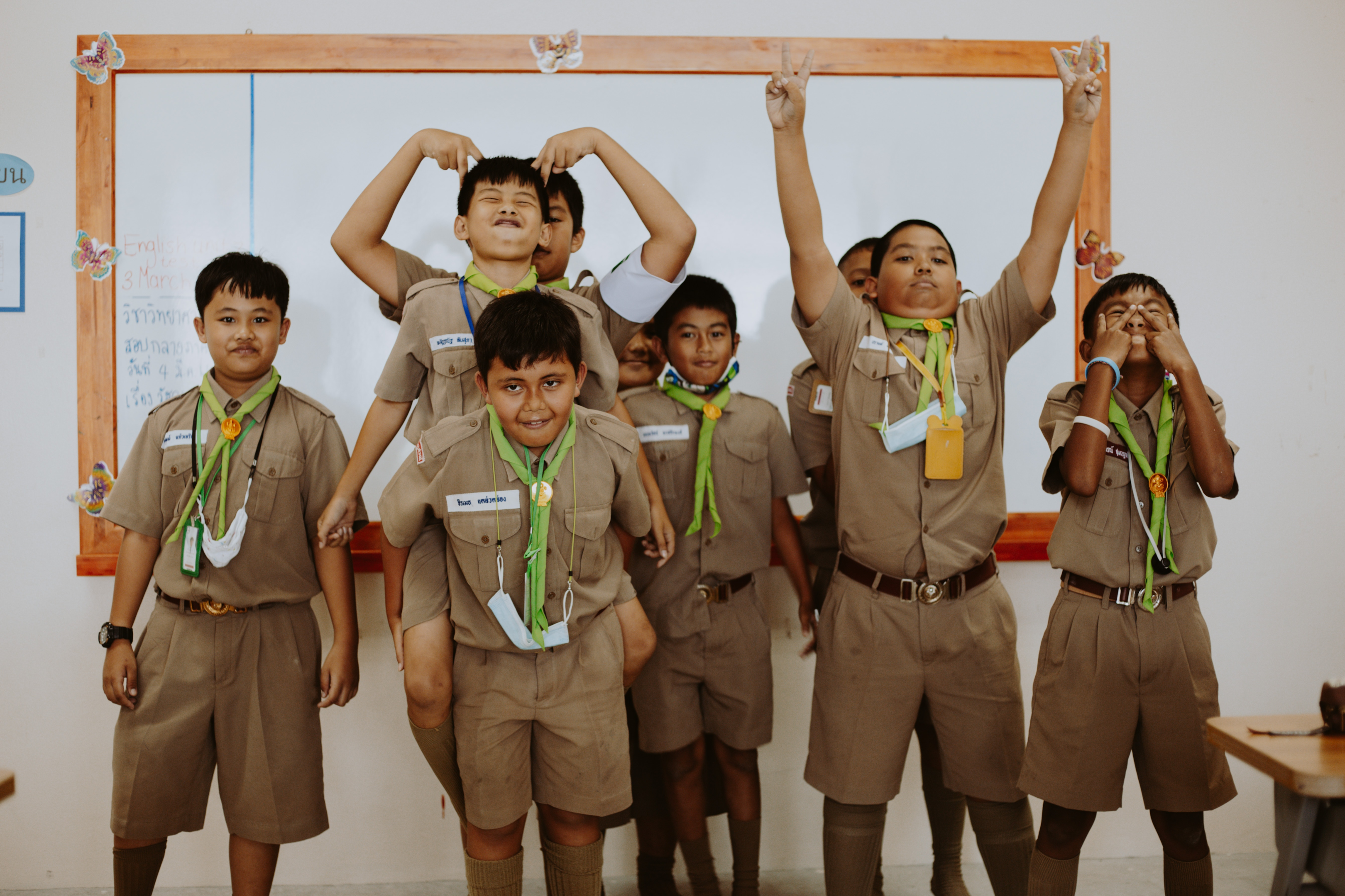 https://www.pexels.com/photo/portrait-of-scout-boys-in-classroom-10637664/