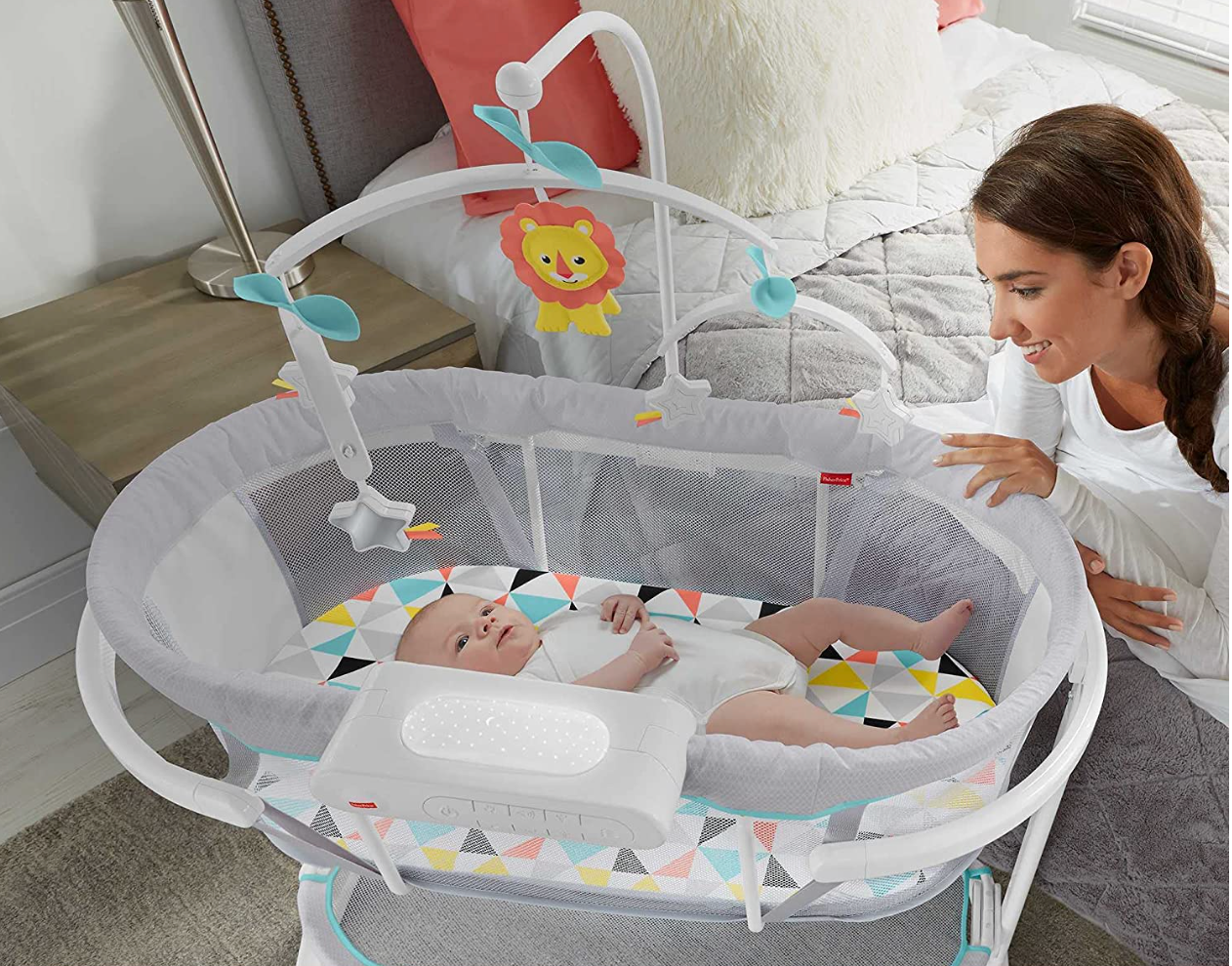 The Fisher-Price Soothing Motions Bassinet arm's reach