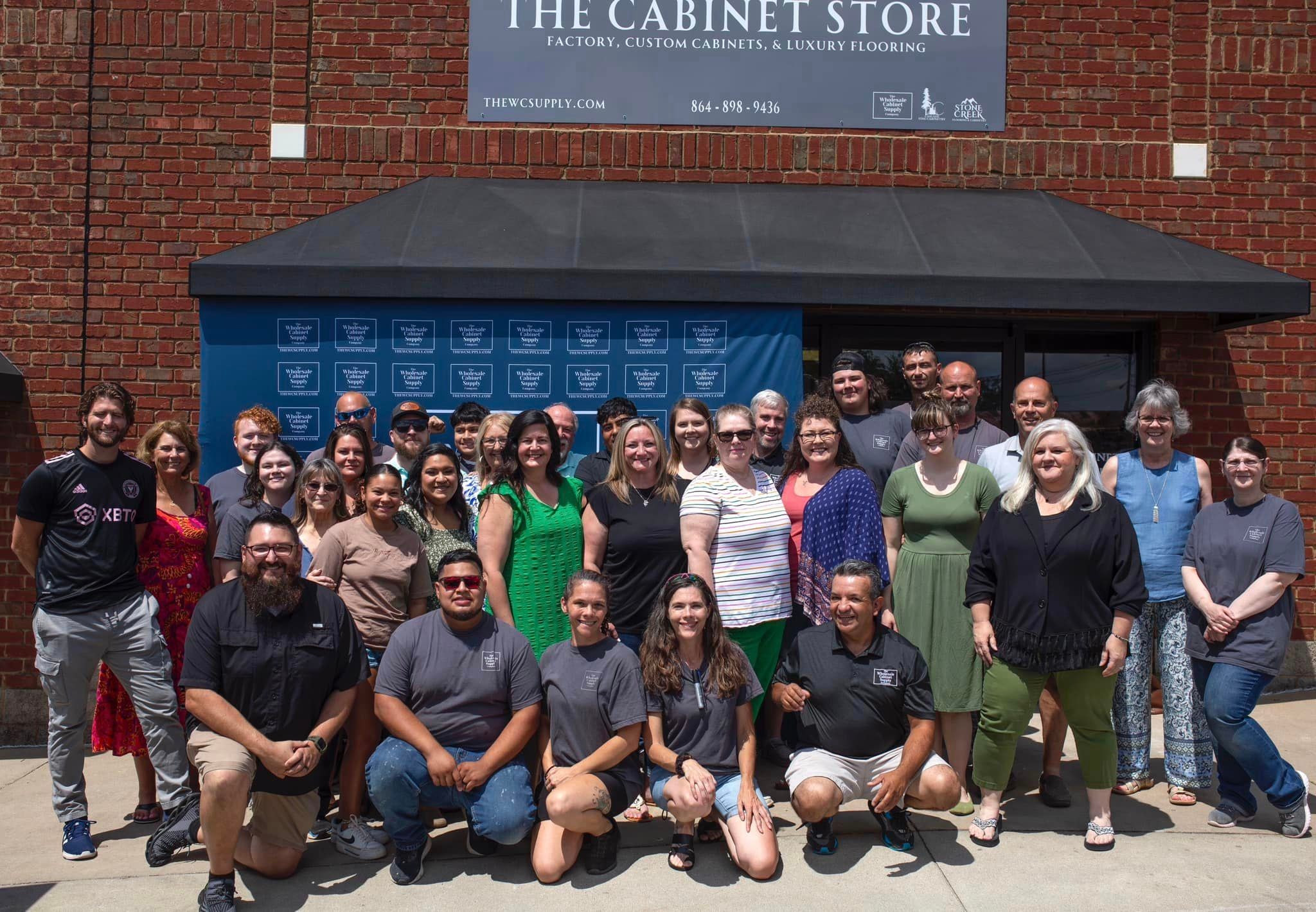In a vibrant showroom, a dedicated team of cabinet designers, builders, finishers and installers collaborates to create dream kitchens, showcasing various styles of kitchen cabinets and cabinetry. Our commitment to customer satisfaction and competitive pricing reflects our goal to transform spaces for homeowners in Greenville, SC.
