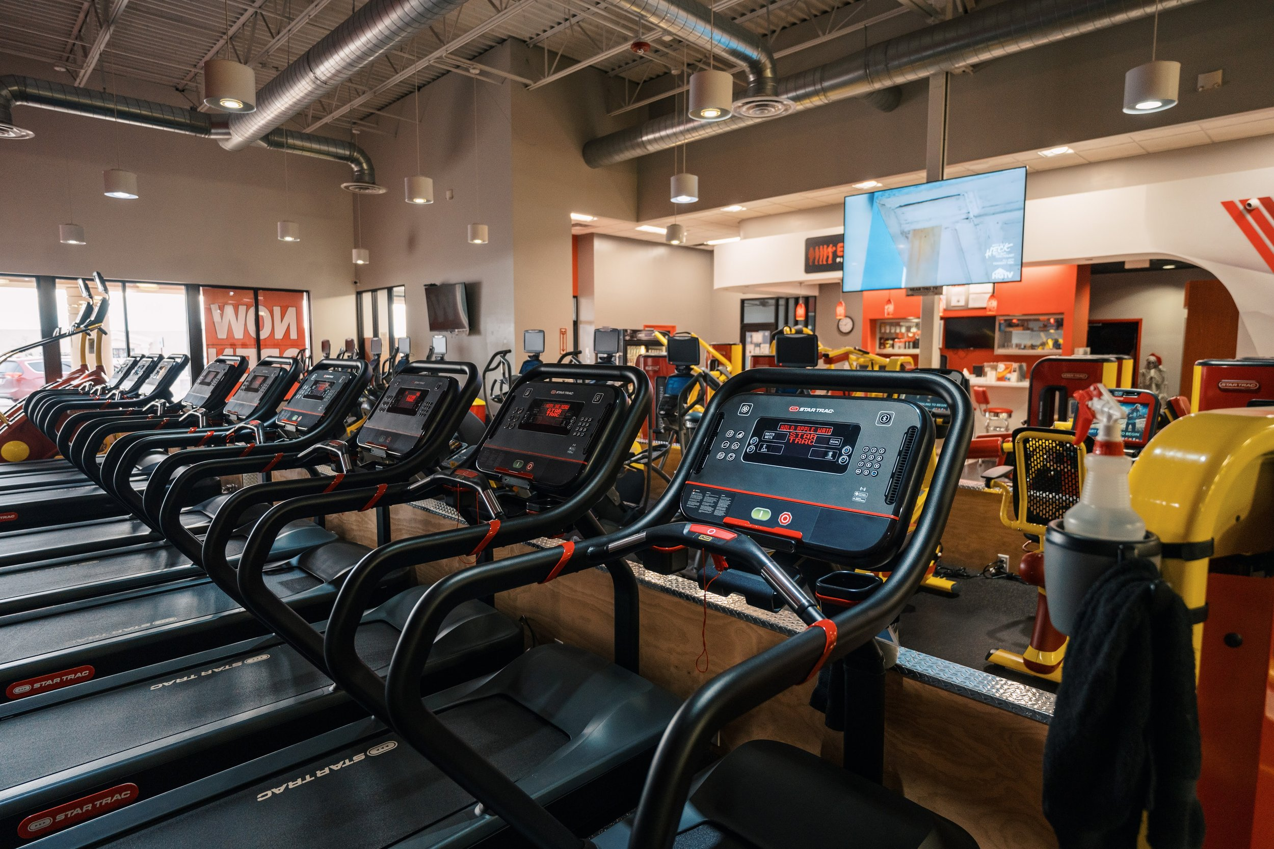 A gym for physical for physical exercise, cardiovascular health, sports and related activities, and exercise programming