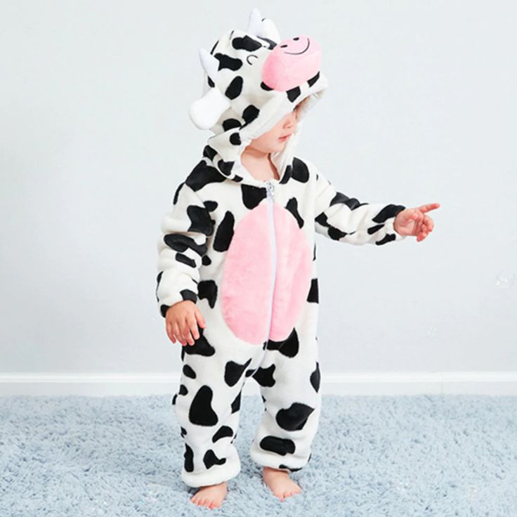 A baby wearing cow-print design Kigurumi