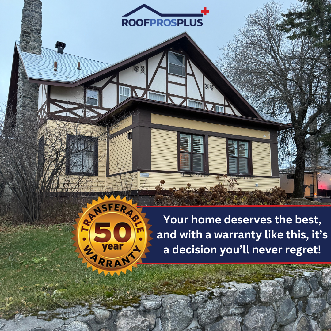 Tudor-style house with a steep, grey metal roof and stone chimney. The "RoofProsPlus" logo at at the top of the graphic. A badge reads "50 year transferable warranty" with text: "Your home deserves the best, and with a warranty like this, it’s a decision you’ll never regret!"