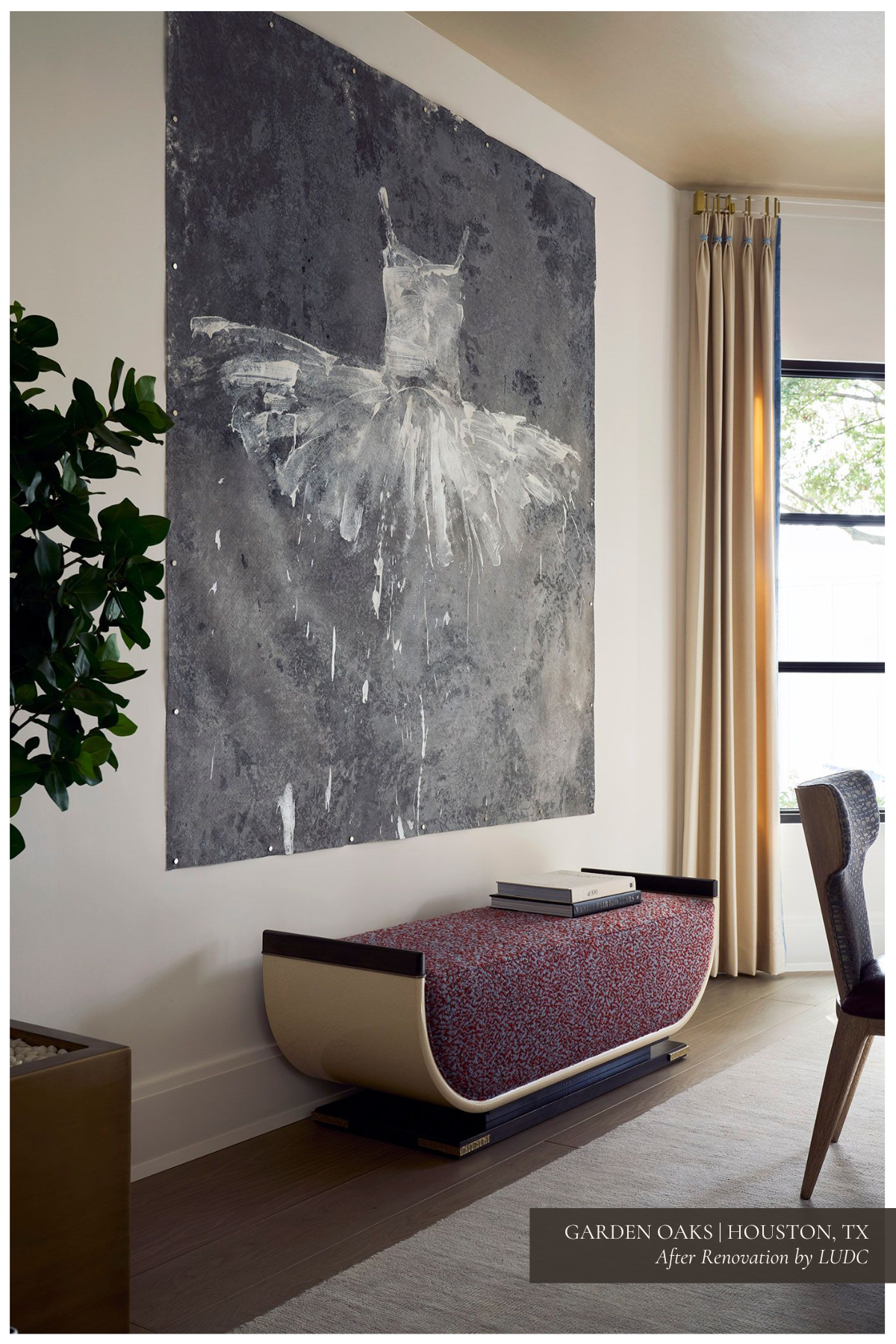 A contemporary vignette featuring a large abstract painting of a ballerina, paired with a curved bench upholstered in red and white fabric. The scene is framed by light drapes and a window letting in natural light.