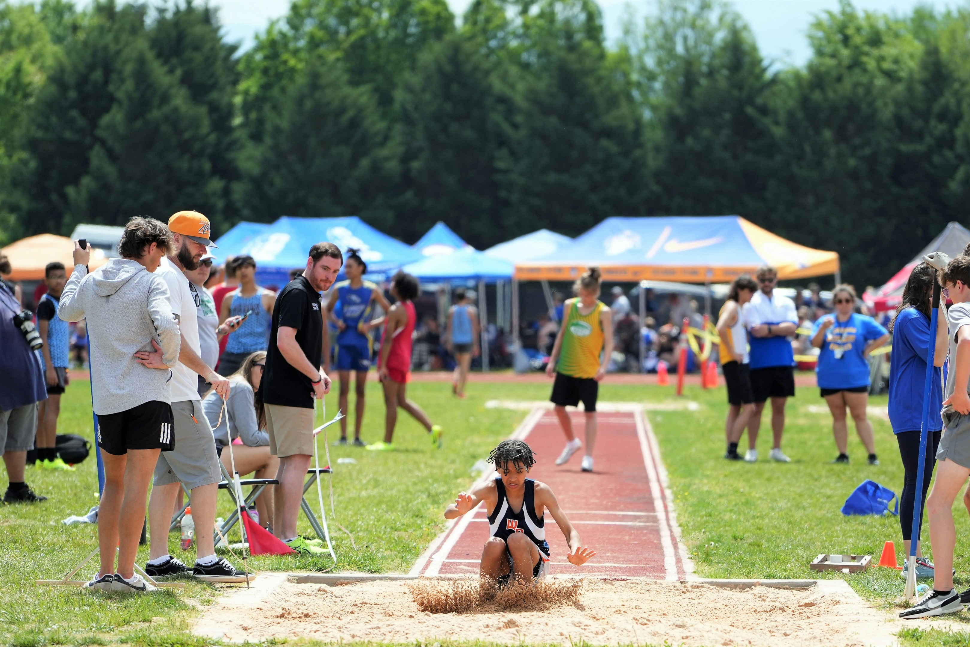 Photo by Chris L: https://www.pexels.com/photo/girl-in-long-jump-competition-17954207/