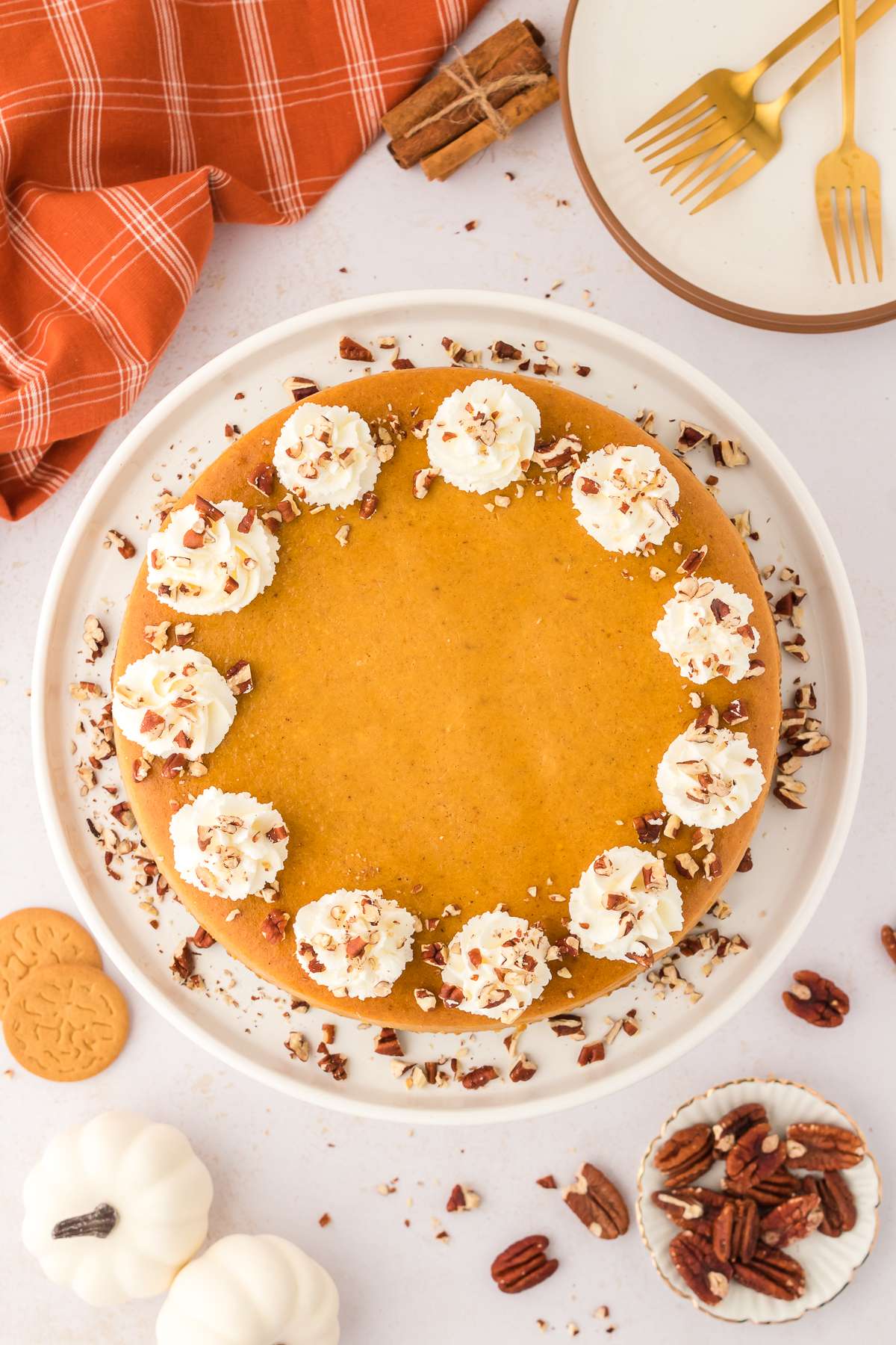 whole pumpkin cheesecake on a platter